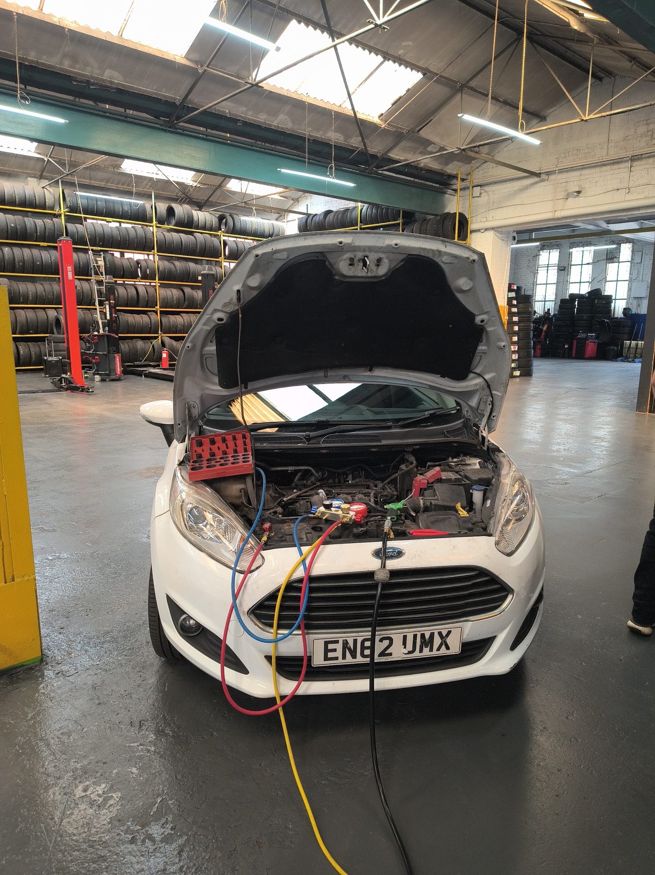 Car having air-conditioning serviced